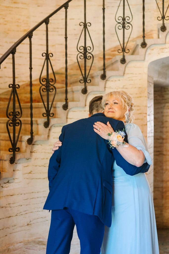 groom first look with his mother at The Howey Mansion captured by Jennifer Holly Photography