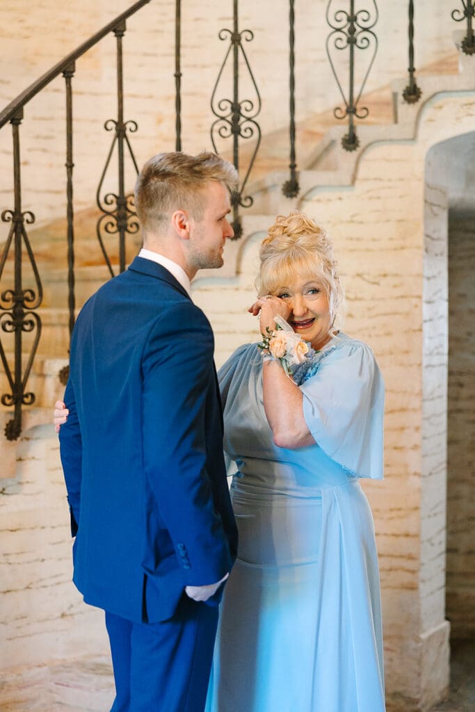 groom first look with his mother at The Howey Mansion captured by Jennifer Holly Photography
