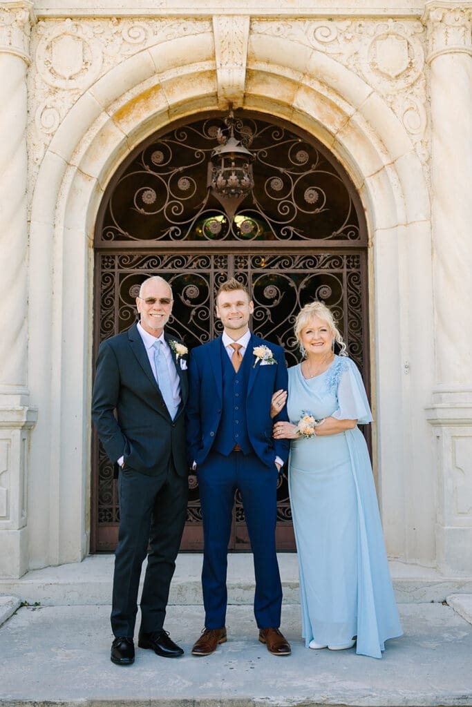 groom with his parents at The Howey Mansion captured by Jennifer Holly Photography