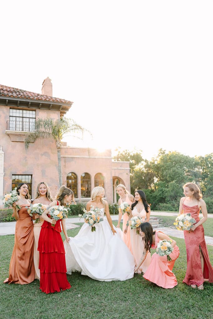 bride with bridesmaids at The Howey Mansion captured by Jennifer Holly Photography