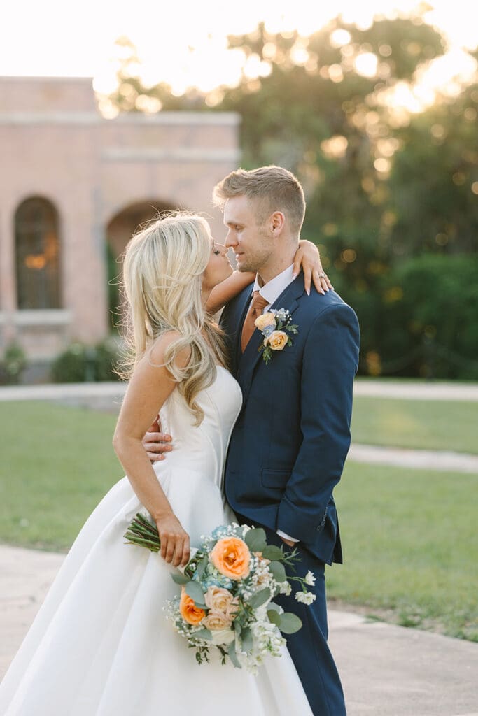bride and groom outdoor wedding portrait at The Howey Mansion captured by Jennifer Holly Photography