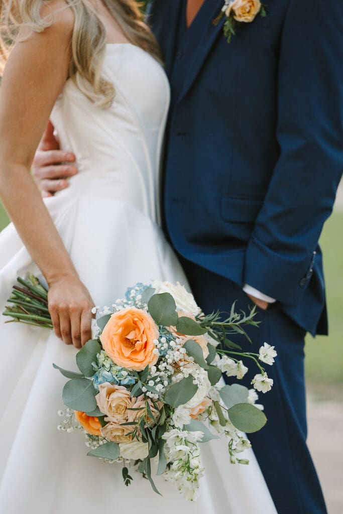 bride and groom outdoor wedding portrait at The Howey Mansion captured by Jennifer Holly Photography