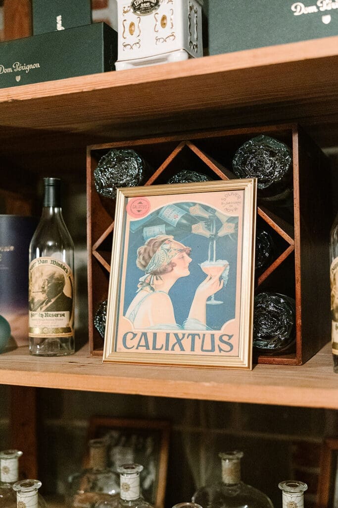 Prohibition Vault Experience details with spirits at The Howey Mansion captured by Jennifer Holly Photography