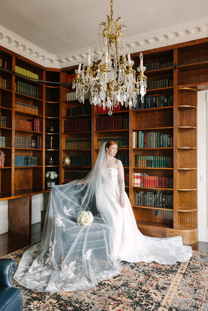 bride portrait in the library at Florida mansion wedding venue, Luxmore Grande Estate, captured by Jennifer Holly Photography