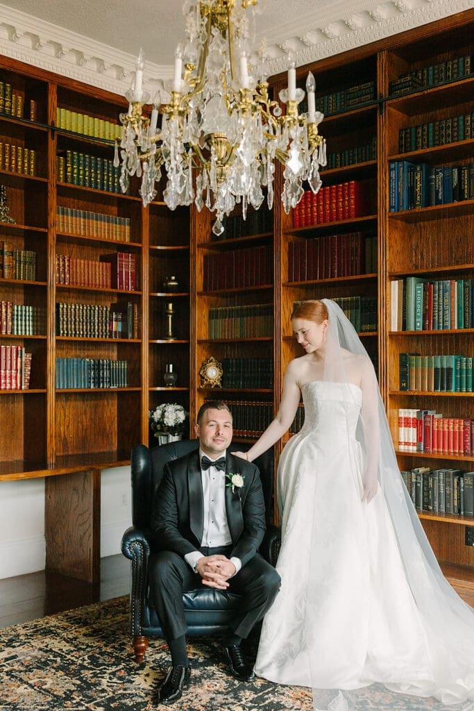 bride and groom portrait in the library at Florida mansion wedding venue, Luxmore Grande Estate, captured by Jennifer Holly Photography