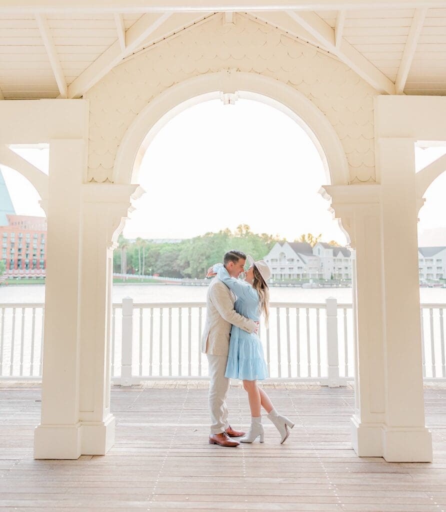 fun and candid couple portrait at Disney Boardwalk