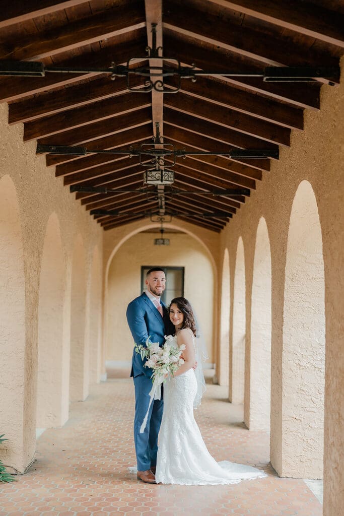 bride and groom at Rollins College in an elopement portrait captured by Jennifer Holly Photography, an Orlando elopement and wedding photographer