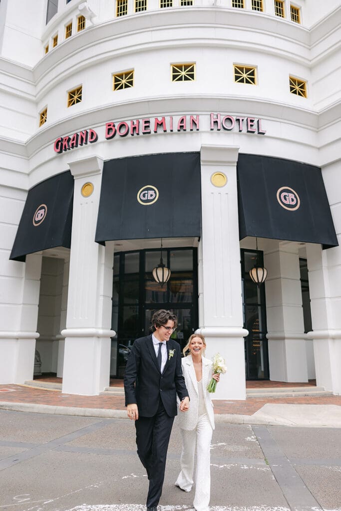 bride and groom at the Grand Bohemian Hotel in downtown Orlando in an elopement portrait captured by Jennifer Holly Photography, an Orlando elopement and wedding photographer
