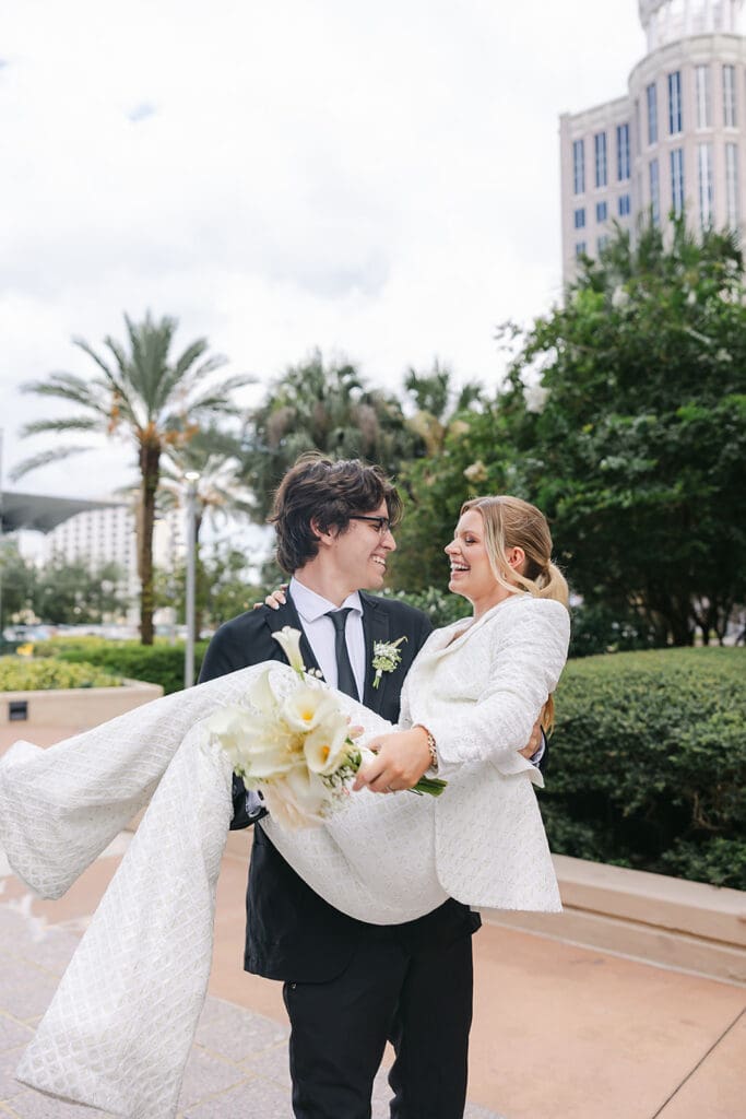bride and groom at the Grand Bohemian Hotel in downtown Orlando in an elopement portrait captured by Jennifer Holly Photography, an Orlando elopement and wedding photographer