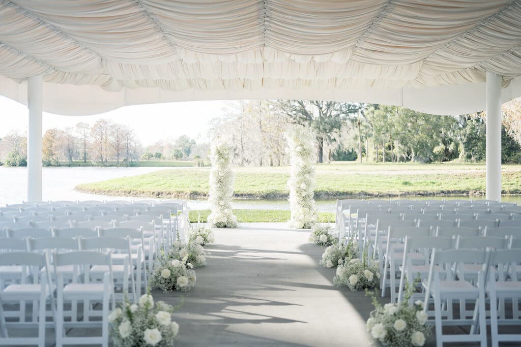 Outdoor wedding ceremony at Hyatt Regency Grand Cypress Resort in Orlando, Florida, captured by Jennifer Holly Photography