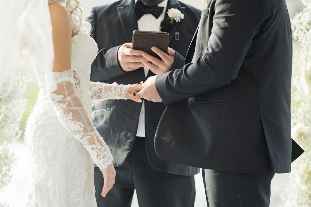 bride and groom in an outdoor wedding ceremony at Hyatt Regency Grand Cypress Resort in Orlando, Florida, captured by Jennifer Holly Photography