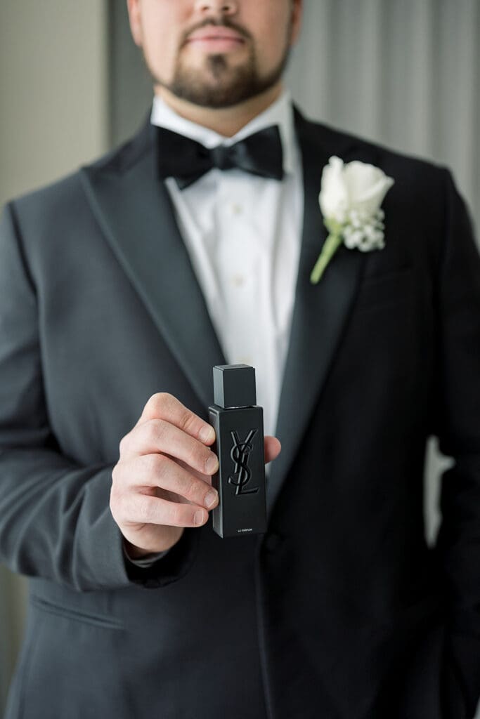 groom getting ready for his wedding at Hyatt Regency Grand Cypress Resort in Orlando, Florida, captured by Jennifer Holly Photography