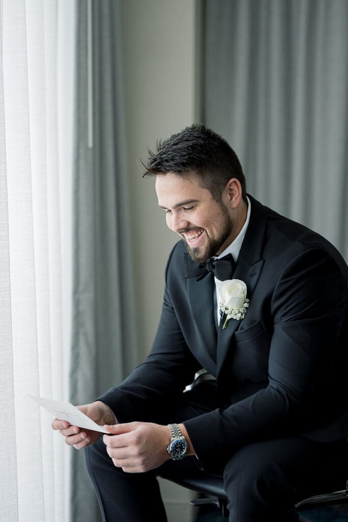 groom getting ready for his wedding at Hyatt Regency Grand Cypress Resort in Orlando, Florida, captured by Jennifer Holly Photography