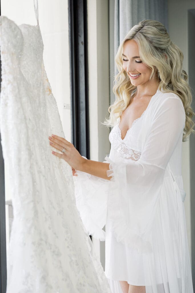 bride getting ready for her wedding at Hyatt Regency Grand Cypress Resort in Orlando, Florida, captured by Jennifer Holly Photography