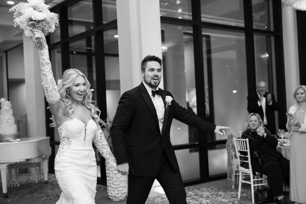 wedding reception bride and groom entrance at Hyatt Regency Grand Cypress Resort in Orlando, Florida, captured by Jennifer Holly Photography