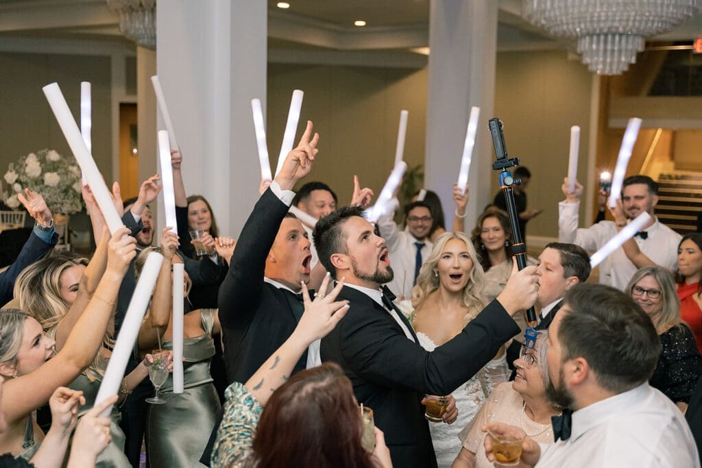 crowd on the dance floor at a wedding reception at Hyatt Regency Grand Cypress Resort in Orlando, Florida, captured by Jennifer Holly Photography