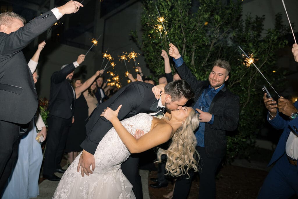 bride and groom sparkler exit from their wedding reception at Hyatt Regency Grand Cypress Resort in Orlando, Florida, captured by Jennifer Holly Photography