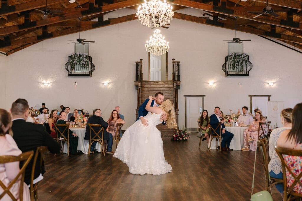 indoor wedding reception first dance at Sterling Event Venue in Minneola FL captured by Jennifer Holly Photography
