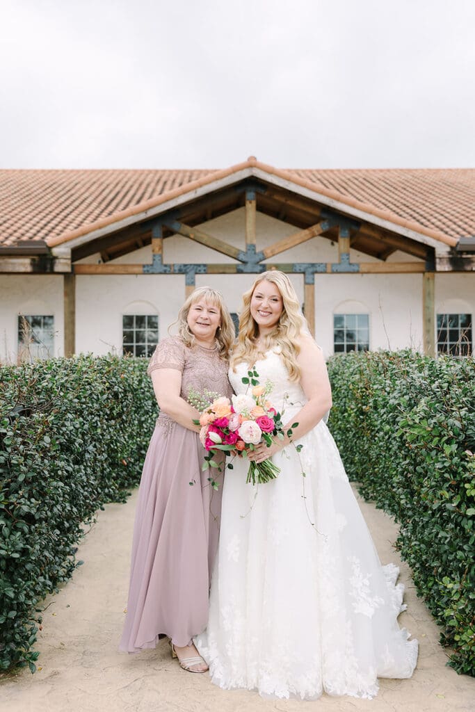 bride with her mother at a Sterling Event Venue wedding in Minneola FL captured by Jennifer Holly Photography