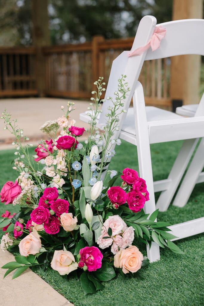 vibrant hot pink and blush floral details at Sterling Event Venue in Minneola FL captured by Jennifer Holly Photography